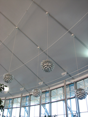 View of hanging lights on tensioned membrane building.