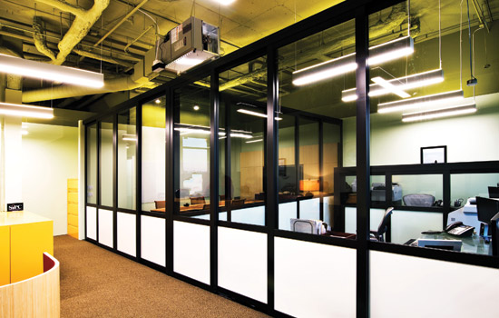 Opening glass walls and retractable partitions help make educational spaces flexible and integral to the school’s instructional vision, as applied to this school in Seattle.