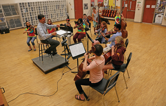 To improve acoustics in a rehearsal room at Wayzata High School in Minnesota, the school installed a specialized digital rehearsal system that allows the music instructors to control the settings to simulate various acoustical environments.