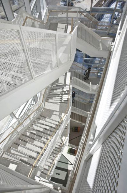 Well-designed metal stairs can be used to connect people as well as floors and serve as artistic focal points in a building.