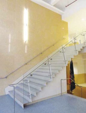 At 26 Broadway, many convenience stairs cut down on the students’ use of elevators in the multiuse building. In the one pictured, the stair’s top riser and tread are welded to a lateral beam with its flange removed thus allowing the stair to function as the beam top chord, creating a less bulky design.