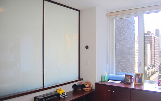 Inside the room, with the wallsswitchable glass set to opaque, enough privacy is created for a guest to feel comfortable in the space. When no guest is visiting, or if the space transforms to a nursery and the parents want to keep an eye on the baby, the windows can be switched to clear.