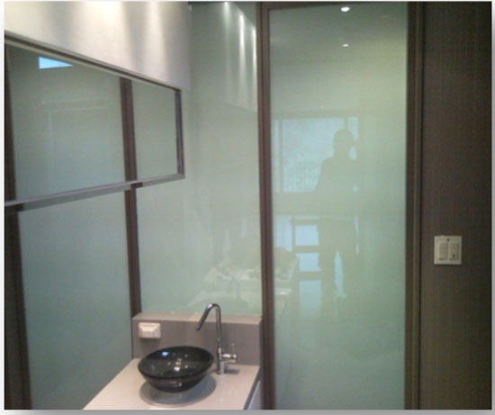 With PDLC smart glass, sections of a bathroom can have privacy or openness as needed, without blocking all the natural light.