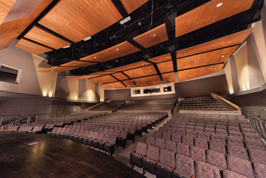 Sound reflectors used on a ceiling help to direct sound towards the listener and enhance the audience experience. 