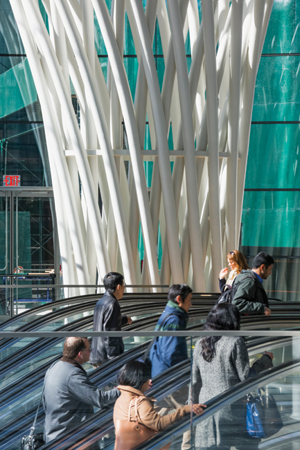 The purpose of the entry pavilion is to move tens of thousands of people a day, a task accomplished in grand style with an open, elegant design.