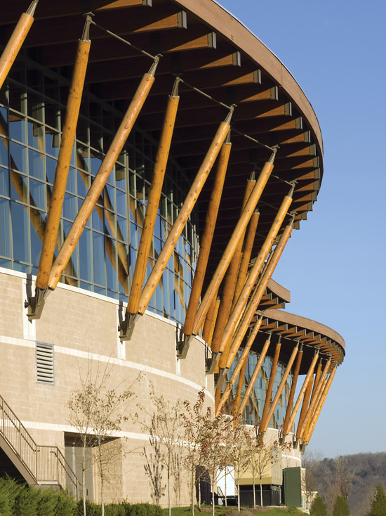 Designed by tvsdesign, the Branson Convention Center in Branson, Missouri, features a large overhanging roof. By sheltering the wood underneath, the roof deflects precipitation and helps to ensure long-term durability.