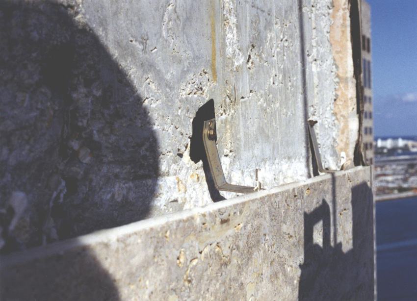 Pictured is an example of an anchor failing due to the bolt placement too far from the bend.