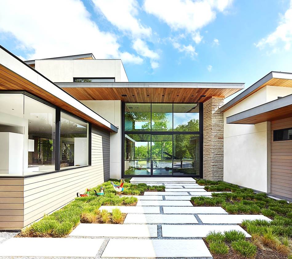 Photo of a building with steel doors and windows.