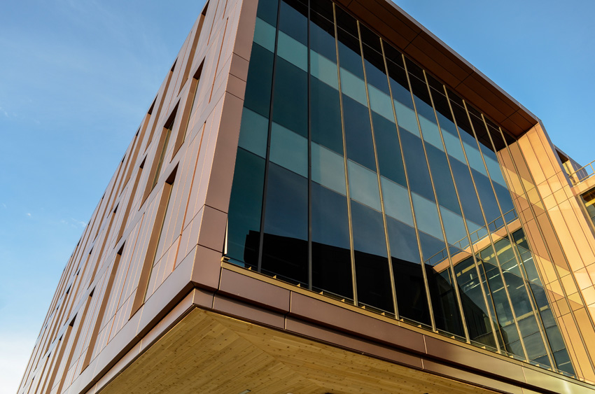 Photo of a building exterior in wood.