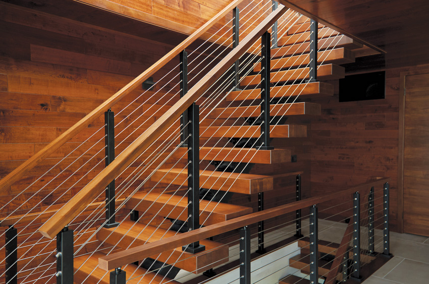 Quarter-turn concrete staircase with solid wood steps