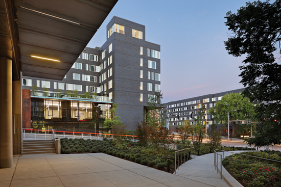 This student housing project in Seattle, Washington includes five buildings, each with five stories of wood-frame construction over a two-story concrete podium.