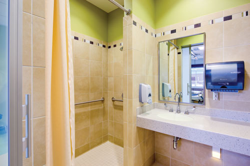 Brightly colored patient bathroom uses a multi-color palette at Banner Ironwood MC.