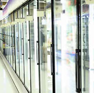 Electrically conductive specialty glass can be used to keep glass panels clear in retail settings where commercial refrigeration is used.