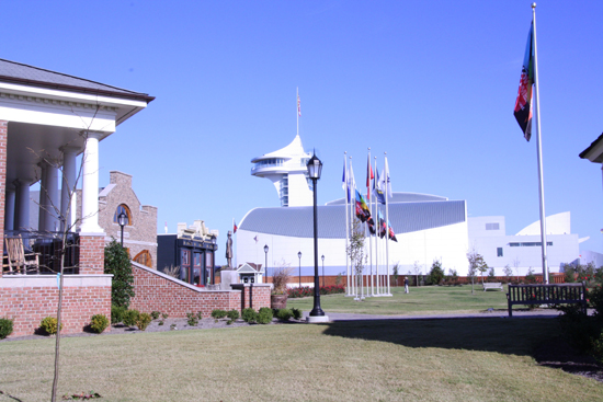 Several major buildings at Discovery Park, including the Discovery Center, observation tower, and Liberty Hall. Also shown, the exterior and interior of Liberty Hall.
