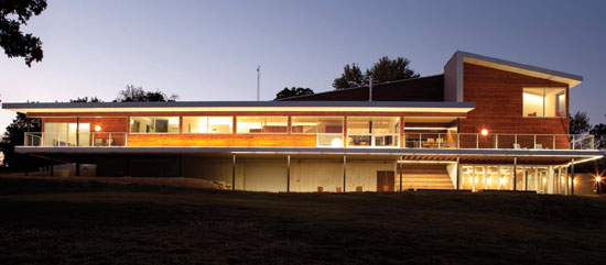 The architecture team at Hufft Projects specified sustainable Grade A clear and Select Knotty grades of Western Red Cedar and a monumental aluminum shed roof, all elevated on steel columns.