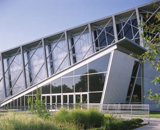 The metal enclosure system for the Bridges Center in Memphis was designed to be environmentally friendly, neighborly, and conducive to youth development, education, and team building.