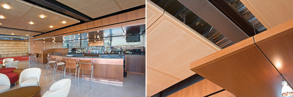 Acoustically treated wood ceiling  panels are used in this public area to balance sound absorption and reflection. Perforated panels contain acoustical material behind for high absorption while solid wood panels offer the right level of sound reflection. 