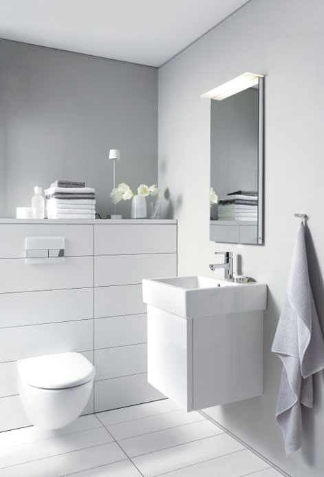 Vanity units are only 18 inches deep but offer ample storage.