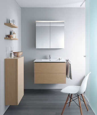 A small space packed with good ideas, including a vanity unit, semi-high cabinet, decorative wall boards, and a mirror with indirect, non-glare LED light.