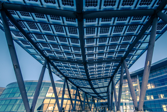 The award-winning Salt Lake Public Safety Building is one of the first net-zero public buildings in the United States. The large aluminum leaf-shaped canopy is composed of aluminum framing and photovoltaic cells that generate 30 kilowatts of power.