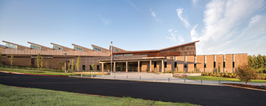 The Sandy High School used structural, insulated, precast concrete wall panels to provide an energy-efficient envelope system, which reduced the amount of structural steel needed for the project.