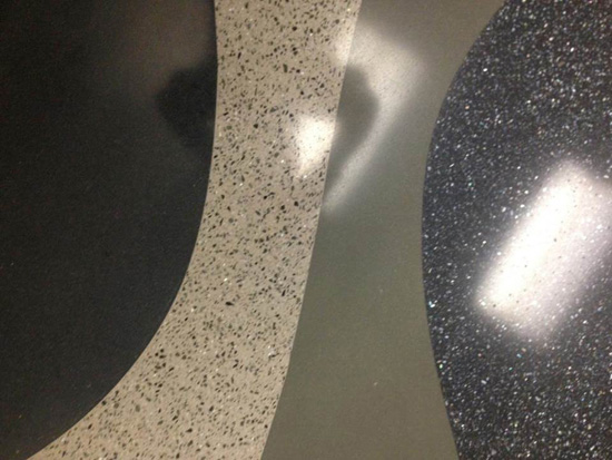 A variety of final finishes are possible with polished concrete overlayments and need to be specified accordingly using aggregates, divider strips, or dyes and colorings.