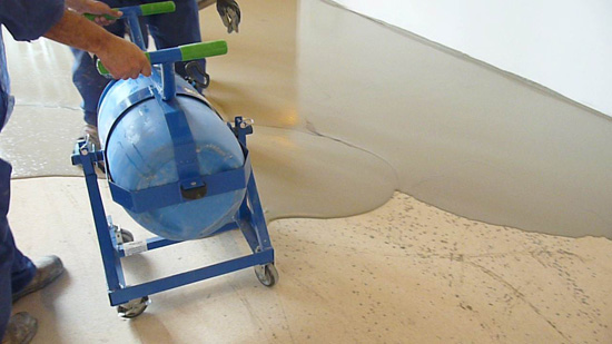 Mixing the overlayment in a batch mixer and placing it evenly over the prepared substrate is done quickly and efficiently at proper temperatures.