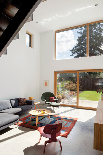 This modern home interior, with European windows, shows how even very large openings are used, reflecting improved comfort for occupants while increasing available daylight and controlling solar heat gain to desired levels.