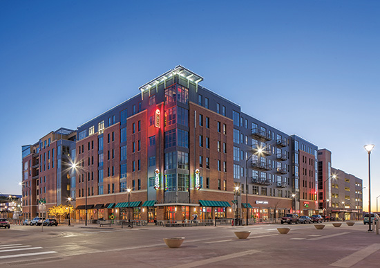 The Canopy Lofts rise seven stories in the historic haymarket district of Lincoln, Nebraska.