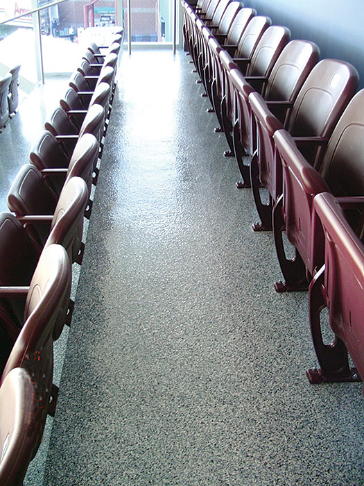 Seamless, poured in place flooring used in general use areas like seating or heavy duty locations such as kitchens can be specified in a variety of product types, colors, textures, and recycled content. 