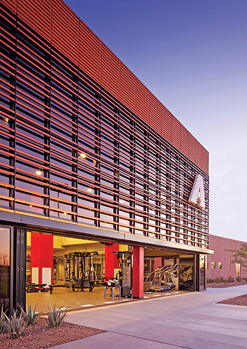 Using opening glass walls helped the Arizona Diamondbacks and Colorado Rockies Salt River Fields spring training facility achieve LEED Gold status. The glass walls provide excellent thermal control when closed with energy savings calculated at 23.5% over baseline. When open, they provide fresh air ventilation for the training facility. 