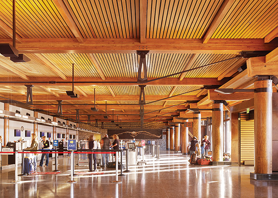 For the Jackson Hole Airport in Wyoming, designers chose wood because of its varied grain and color palette, as well as its ability to perform structurally under a variety of loading conditions. The inherent fire performance of heavy timber construction was vital in allowing the wood to be exposed. Winner of a 2015 WoodWorks Wood Design Award.