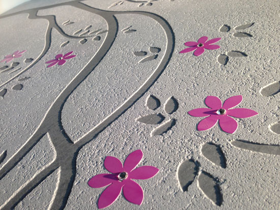Stenciled applications of different plasters and colors can create artistic and varied designs.