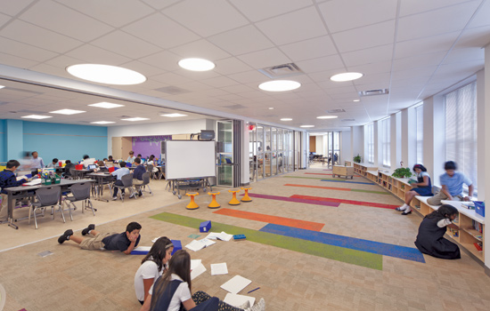 Movable walls provide flexible, collaborative spaces that enhance learning at the Booker T. Washington STEM Academy in Champagne, Illinois, by CannonDesign.