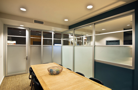 Multi-panel sliding doors can enclose a small study room or open up to create a larger collaborative space.
