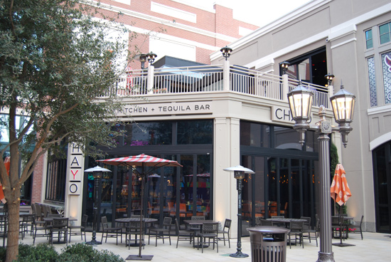 The Chayo restaurant at the Linq Hotel and Casino in Las Vegas increased their seating capacity with large glass door openings in the summer months while keeping the weather out in colder months.
