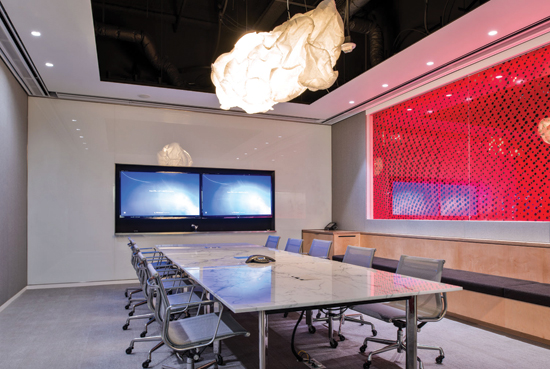Gensler’s Los Angeles conference room features beams that have been installed end to end to create a single long beam along each wall.