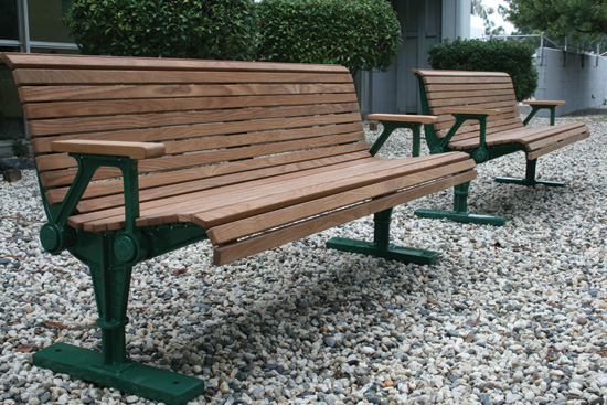 Thermally modified wood benches provide comfortable seating in high-use areas.