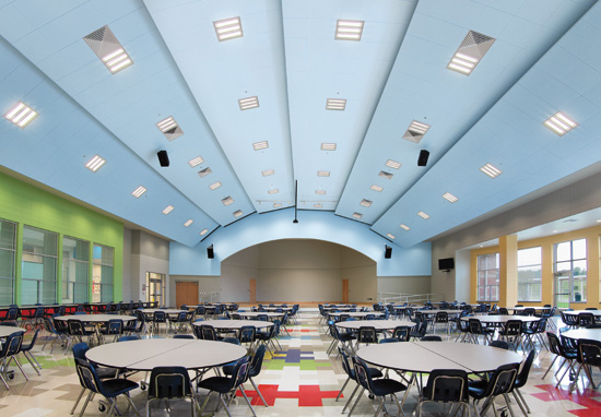 Perforations in metal ceilings provide acoustic benefits. Perforations vary in size according to aesthetic needs. 