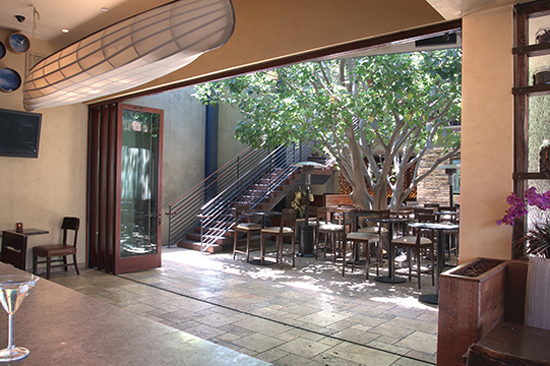 At the Rockwell VT in California a clad glass folding door system provides the flexibility to have all seven panels open, or closed, with just the daily door providing access.