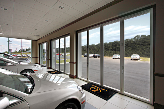An all-aluminum folding glass door system gives Lexus dealership customers a feeling of being in a high-end home.