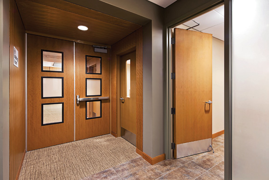 Wood veneer doors at the Duke Cancer Center were specified for their ability to create a warm, inviting look, promoting patient comfort and privacy.