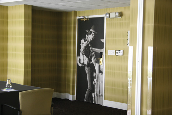 Specialty HPDL doors for a hip Washington, D.C. hotel feature an image of Jimi Hendrix.