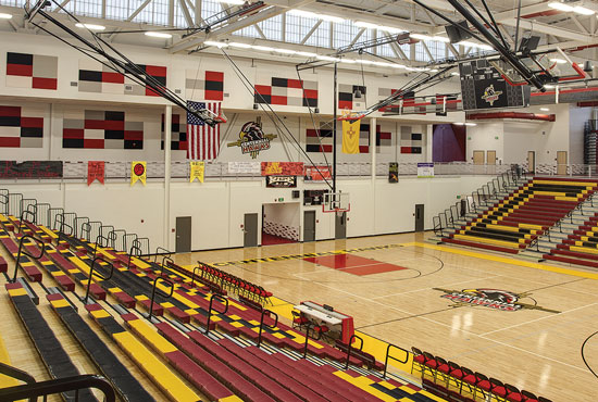 Gymnasiums are designed to accommodate many types of sports, athletes, and spectators, either concurrently or consecutively.