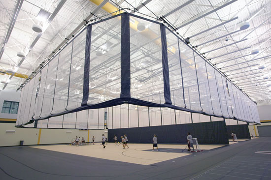 Divider curtains allow a variety of sports to be played inside a gymnasium and protect participants from errant balls.