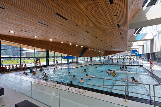 The award-winning, sustainably designed Regent Park Aquatic Centre in Toronto designed by MacLennan Jaunkalns Miller Architects employs Western Red Cedar for its large and expressive soffit. 