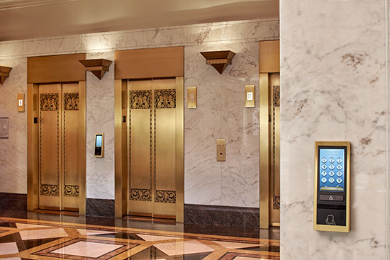 Destination dispatch input devices may be located in the lobby or in the elevator bank. 