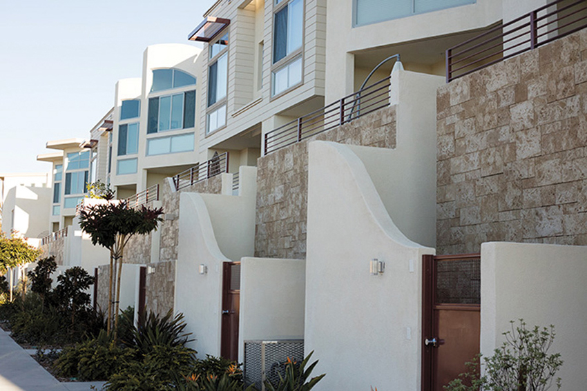  Architectural manufactured stone veneer can be used creatively in a variety of ways to enhance the texture and color of a multifamily building facade with quicker installation and less cost than conventional stone. 