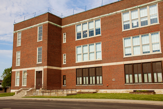  Houghton Academy replaced the aging, inconsistent windows (shown on the first floor) with a unified look, dual color finishes, and high performance (shown on the second and third floors). 