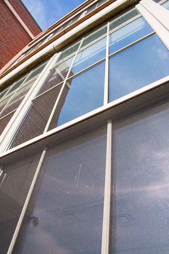 Houghton Academy replaced the aging, inconsistent windows (shown on the first floor) with a unified look, dual color finishes, and high performance (shown on the second and third floors). 
